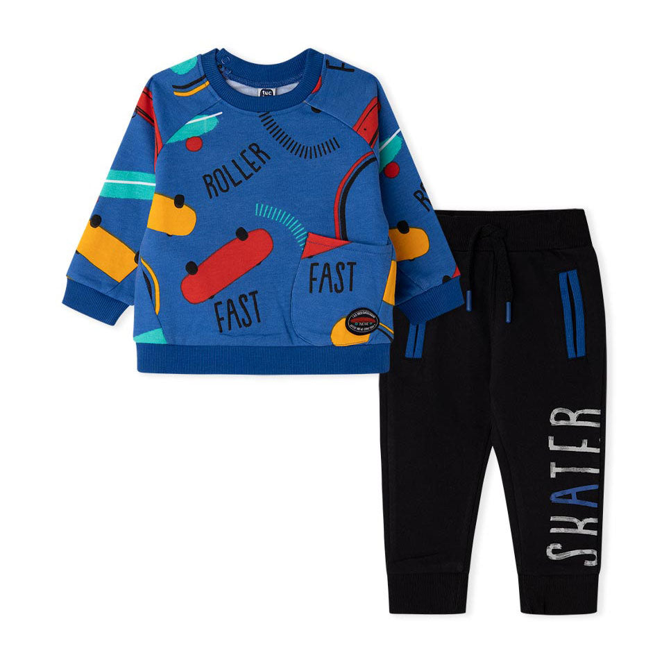 
Tracksuit from the Tuc TUc Childrenswear Line, with multicolor patterned sweatshirt and trousers...