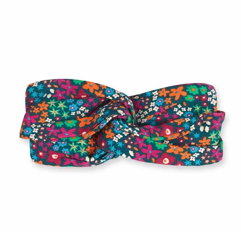 Hair band from the Tuc Tuc Girls' Clothing Line, with colored microflower pattern.
Composition: C...