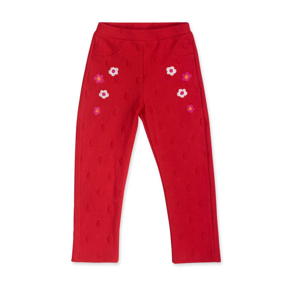 Trousers from the Tuc Tuc girls' clothing line, with flowers embroidered on the front and fake po...