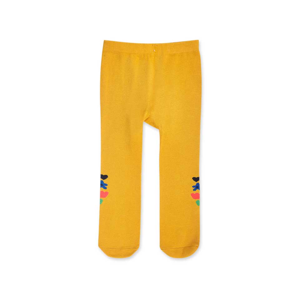 
Wool tights from the Bmabina Tuc Tuc clothing line, with floral pattern on a yellow background.
...